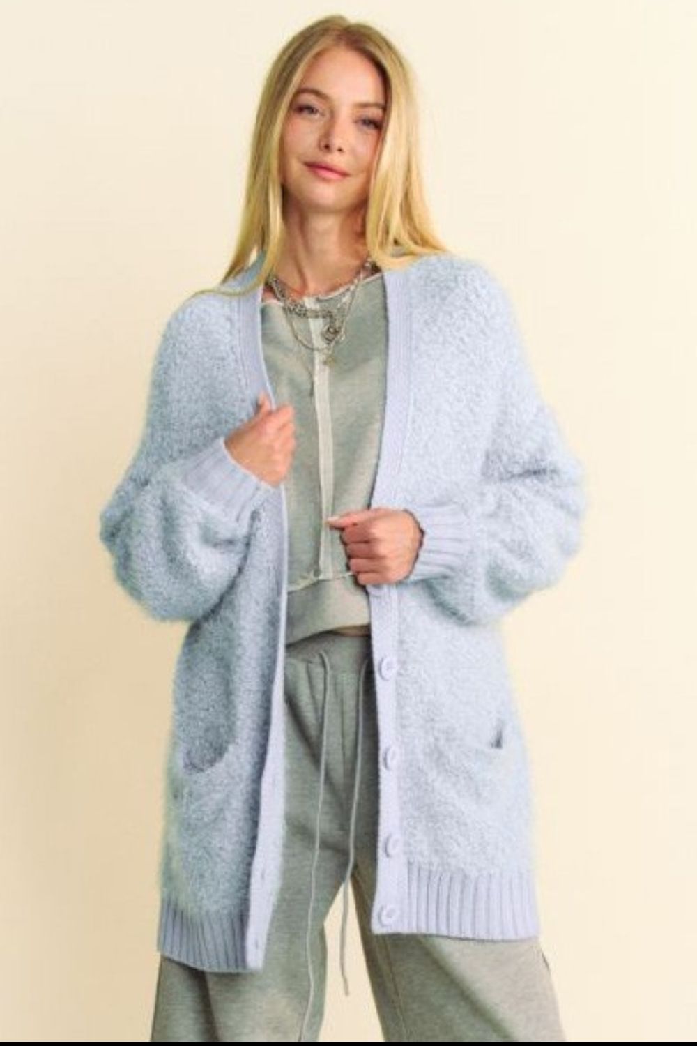 Light blue ribbed hem button-up cardigan, perfect for cozy winter layering and stylish online shopping.