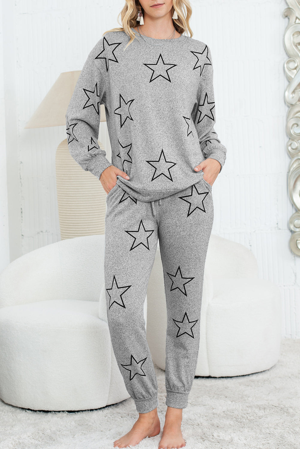 Conjunto de pantalón con cordón y top de manga larga con estampado de estrellas negras