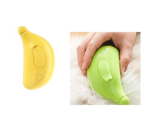 Pet steam cleaning brush in yellow and green colors, designed for effective grooming and massage for cats and dogs.