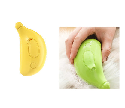 Pet steam cleaning brush in yellow and green colors, designed for effective grooming and massage for cats and dogs.