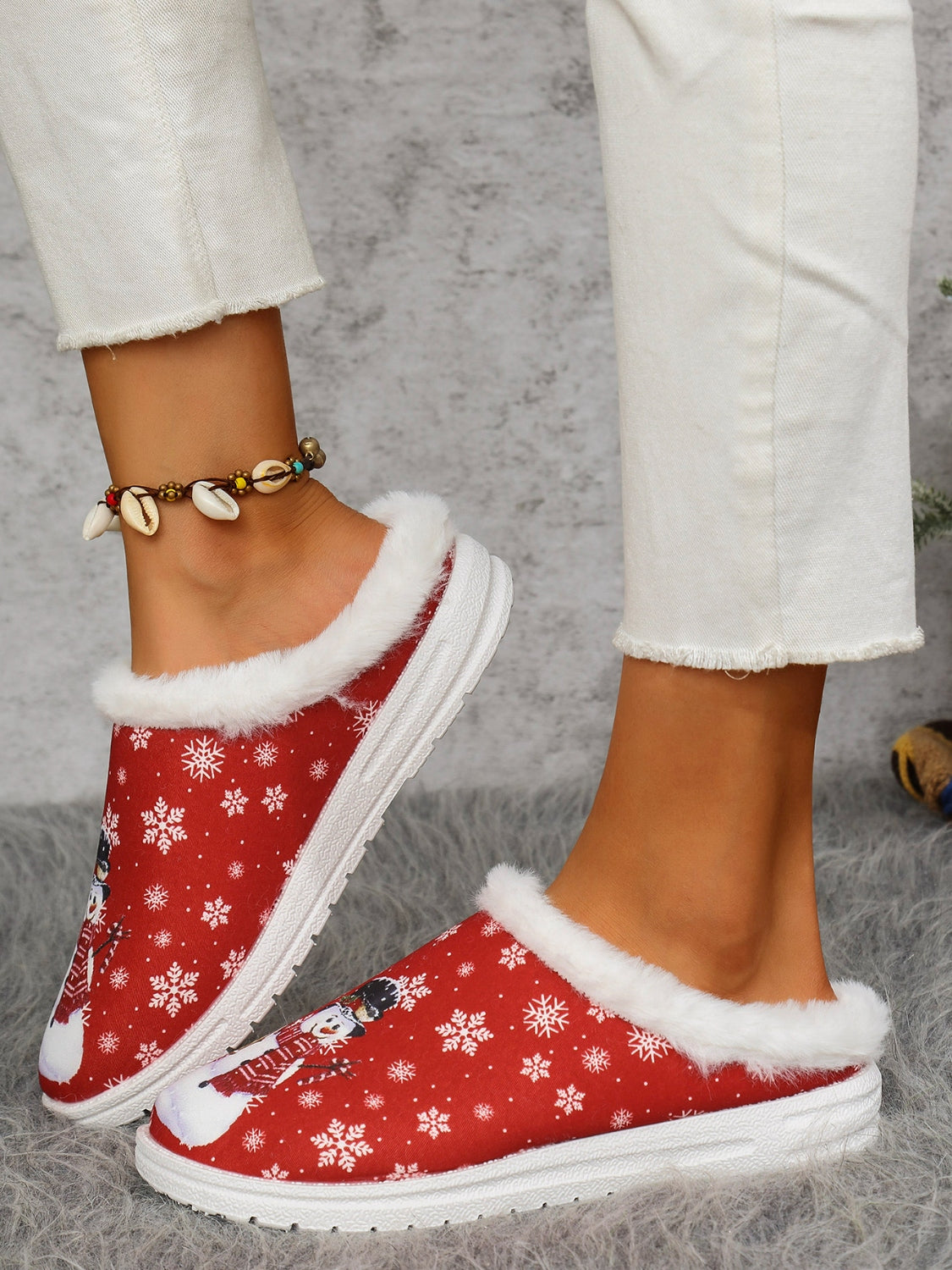 Festive snowman print flat slippers with faux fur trim, perfect for cozy holiday styling and new arrivals.