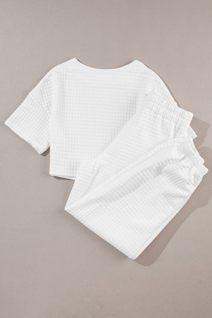 Conjunto de camiseta corta con textura de celosía blanca y pantalón jogger
