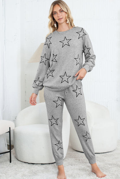 Conjunto de pantalón con cordón y top de manga larga con estampado de estrellas negras