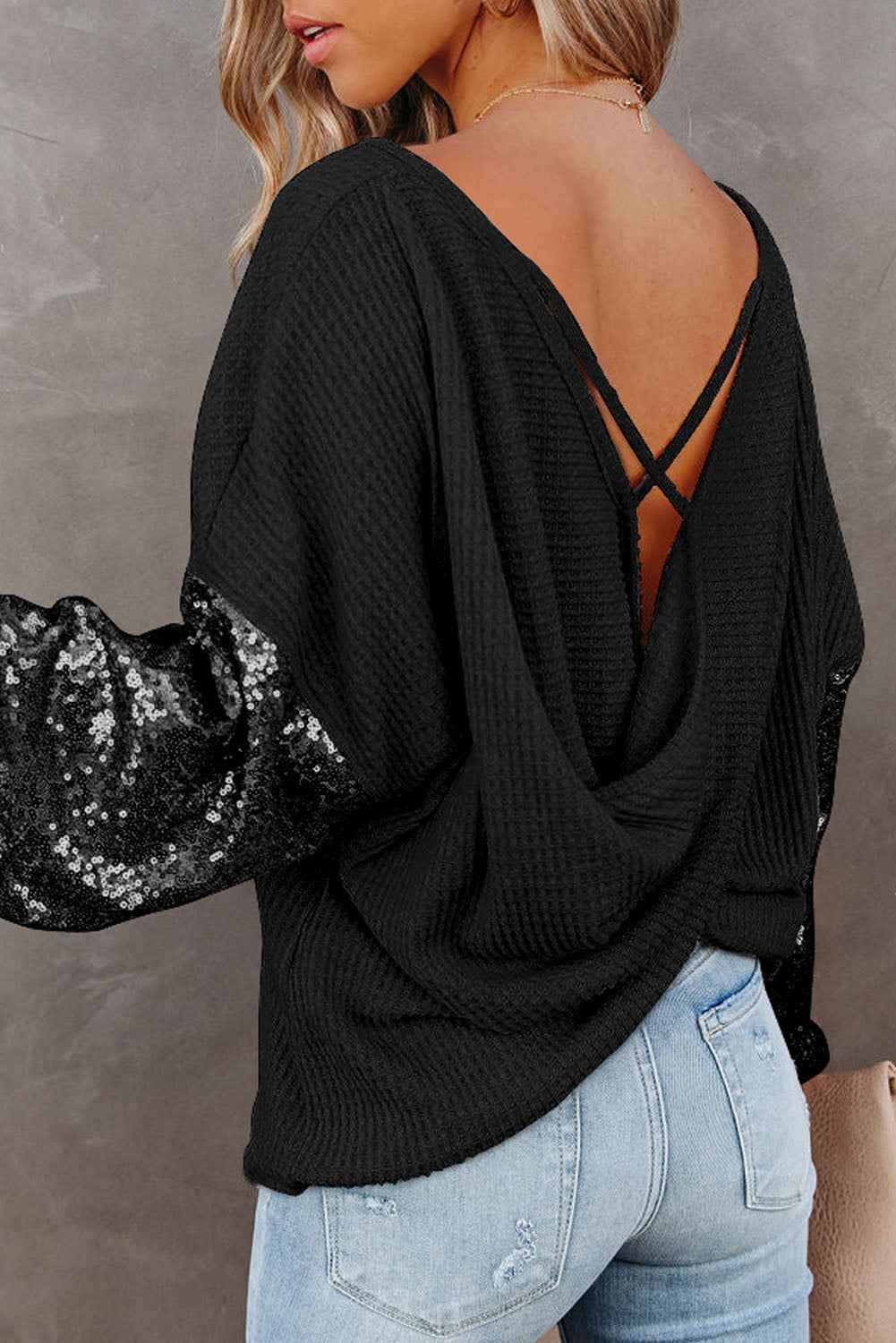 Blusa de punto gofrado con lentejuelas